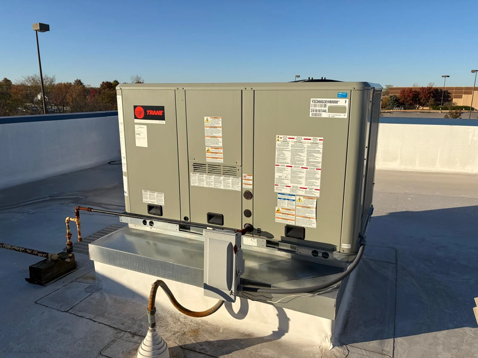 Trane rooftop packaged unit installation with electrical disconnect